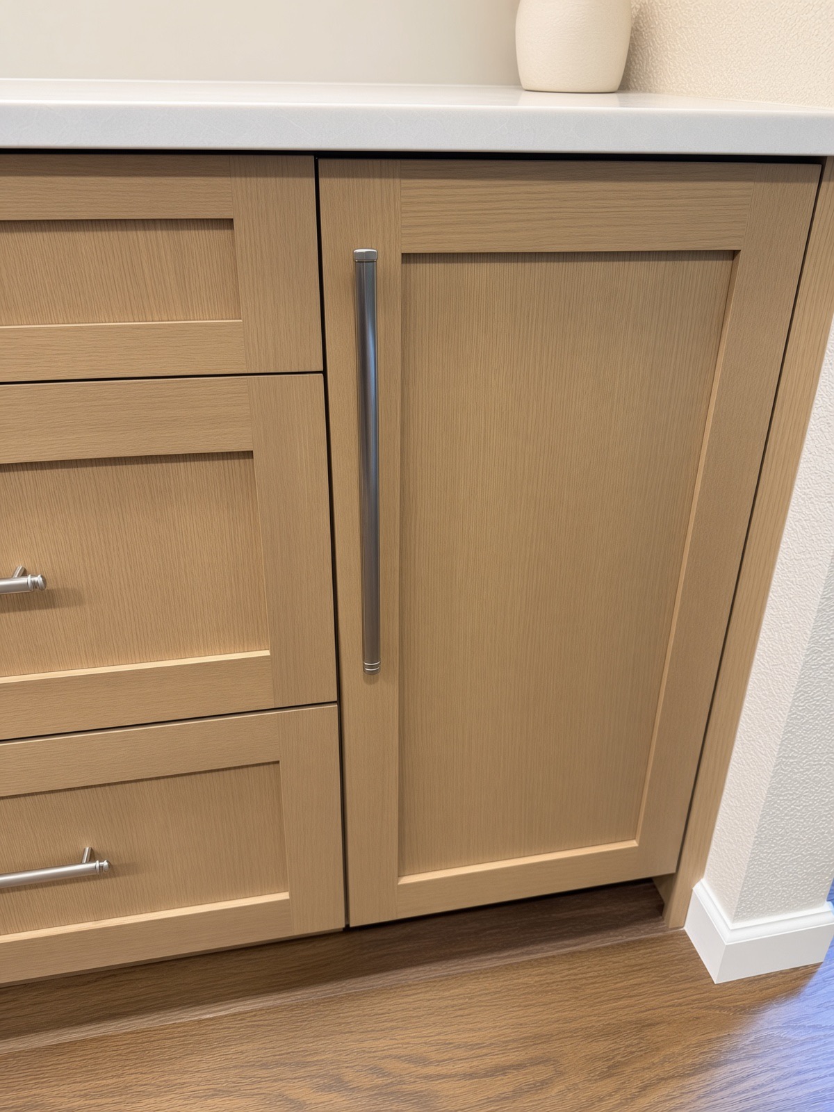 Integrated ice maker cabinet in the Bothell kitchen